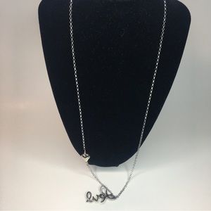 Sterling silver necklace with silver love pendant
